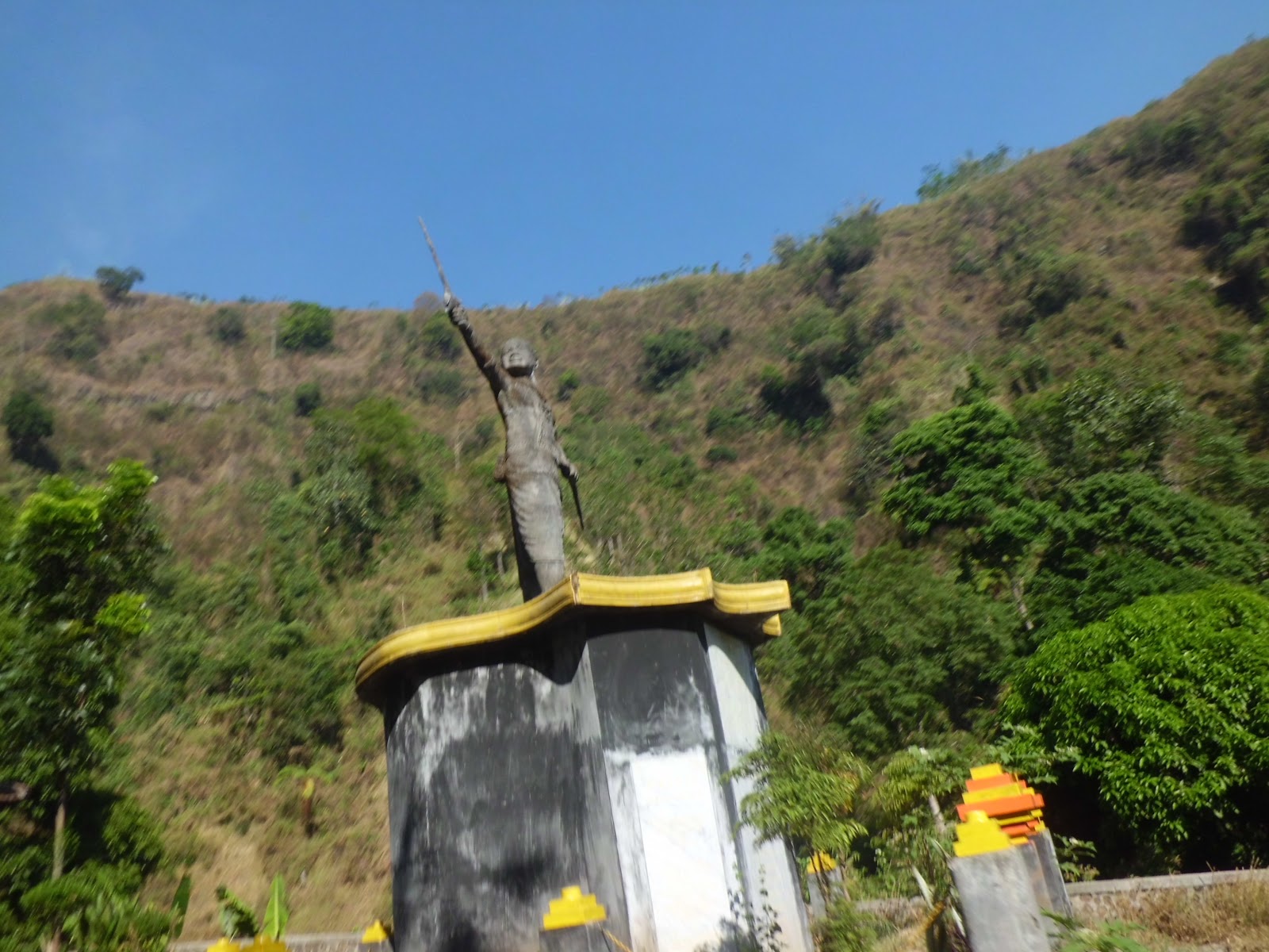 Gajah Mada standing statue with kris pointing east